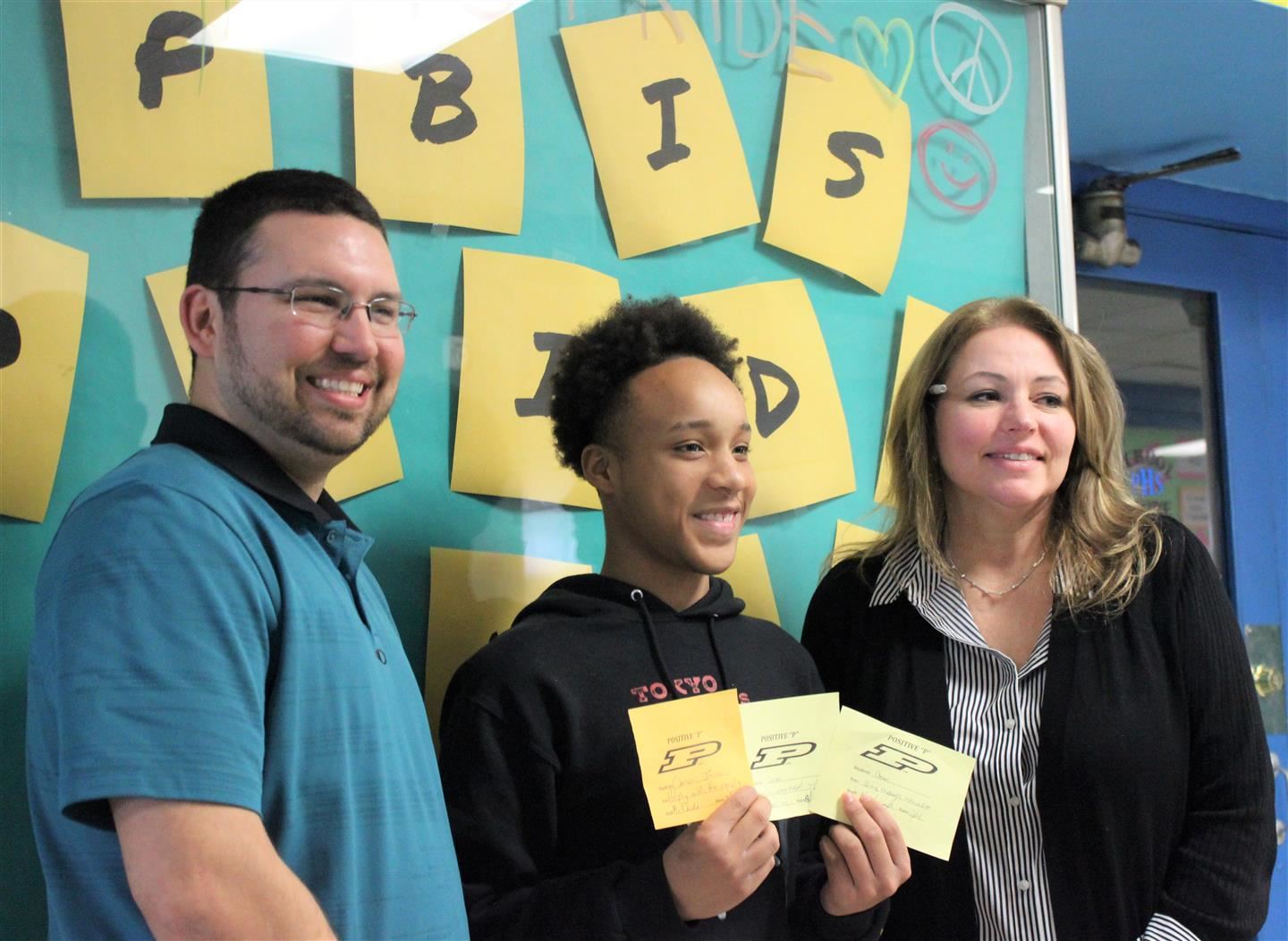 student Omari James who was chosen as the first Pioneer Power Positive P winner.
